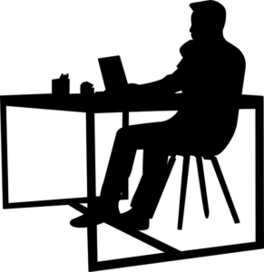 Financial advisor working at a desk.