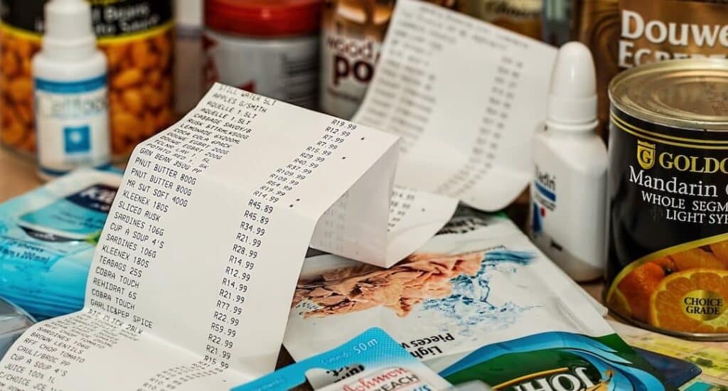 Groceries and receipt to illustrate looking for cost saving opportunities.