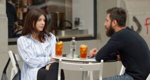 Couple discussing financial matters to illustrate how to stop fighting over money.